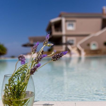 Pictures Suites Агиос Стефанос Экстерьер фото