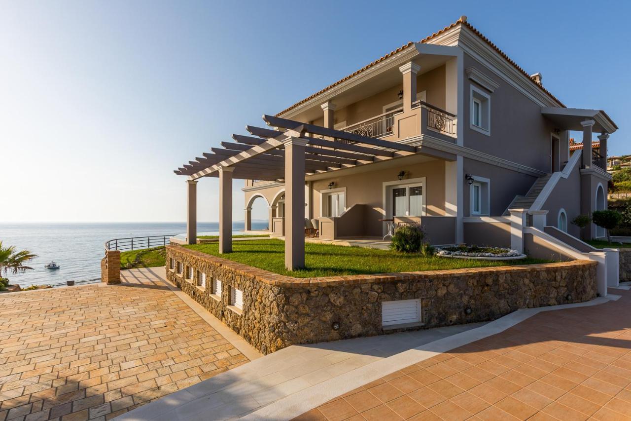 Pictures Suites Агиос Стефанос Экстерьер фото