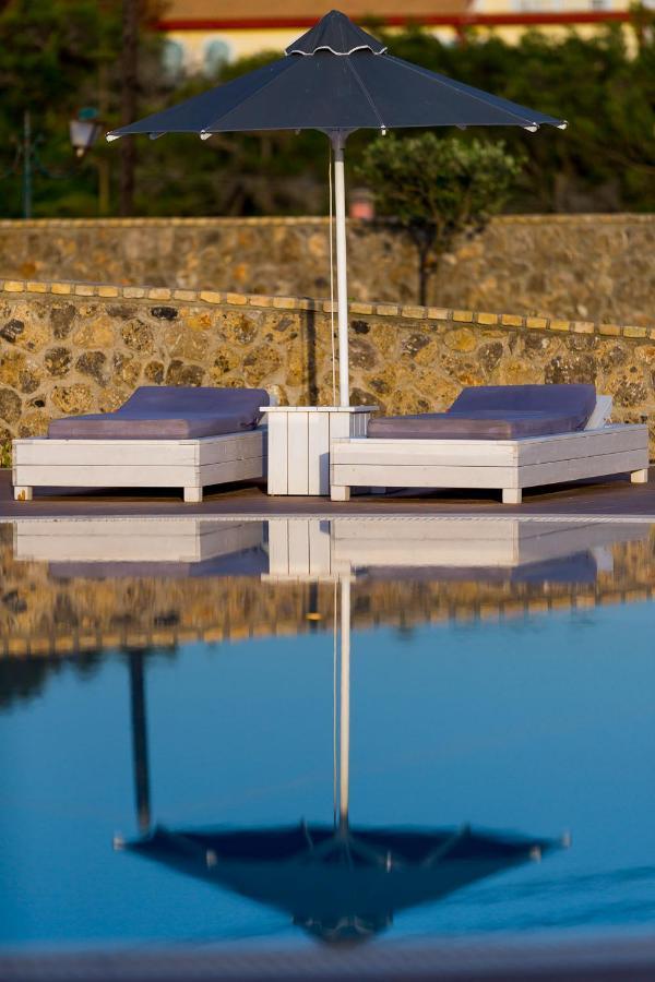 Pictures Suites Агиос Стефанос Экстерьер фото