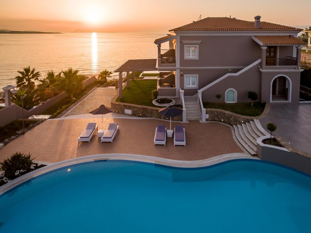 Pictures Suites Агиос Стефанос Экстерьер фото