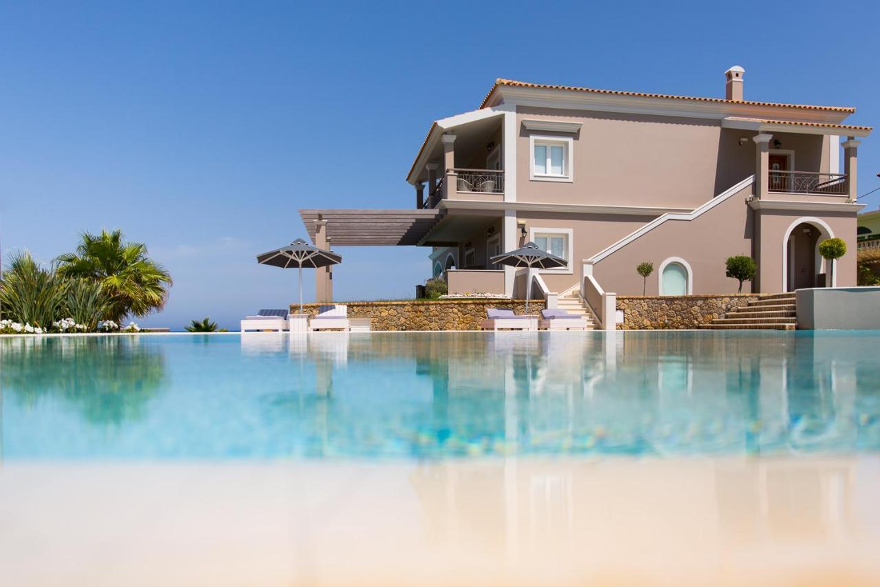 Pictures Suites Агиос Стефанос Экстерьер фото