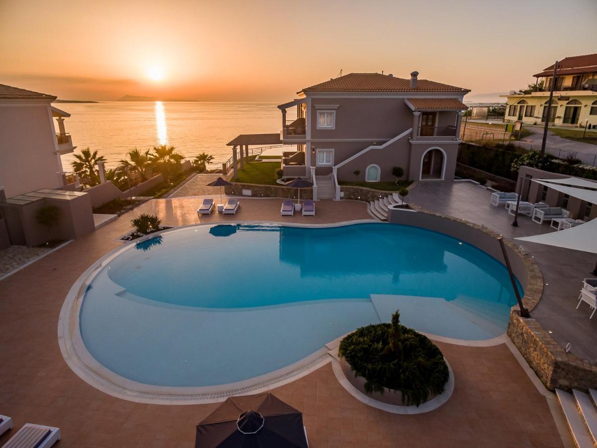 Pictures Suites Агиос Стефанос Экстерьер фото