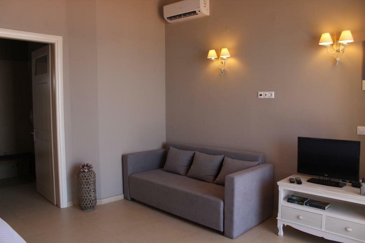 Pictures Suites Агиос Стефанос Экстерьер фото