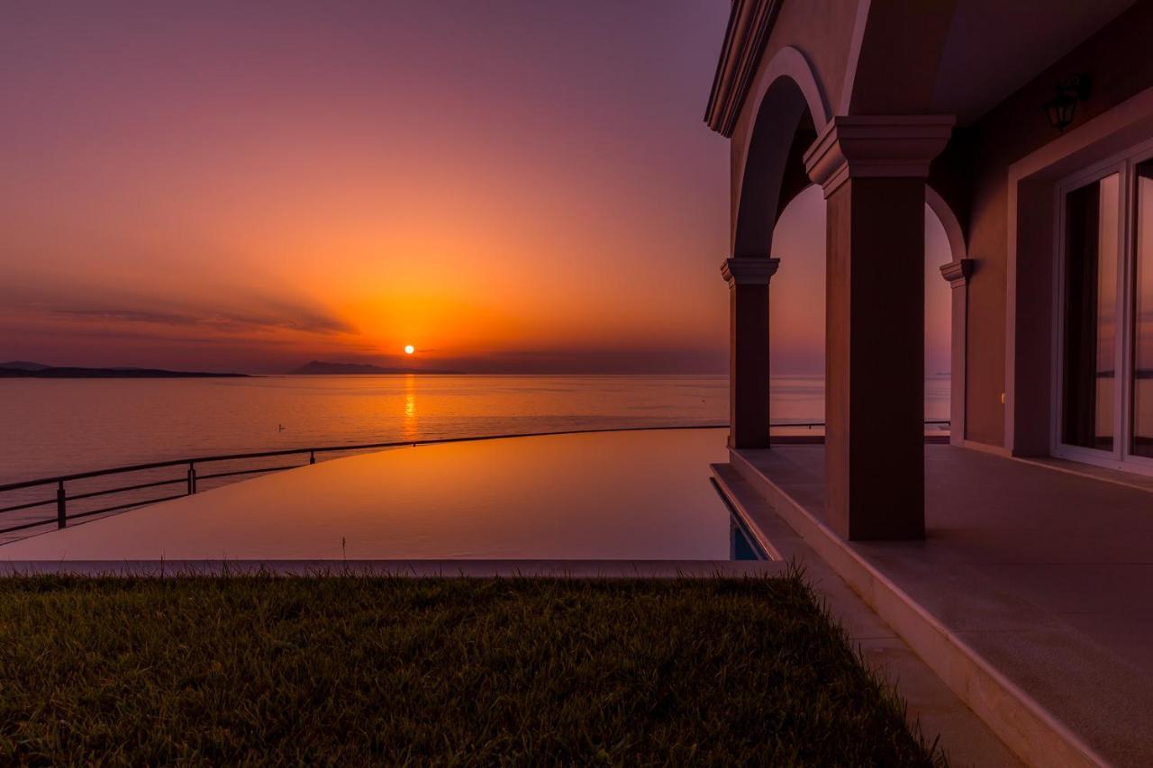 Pictures Suites Агиос Стефанос Экстерьер фото